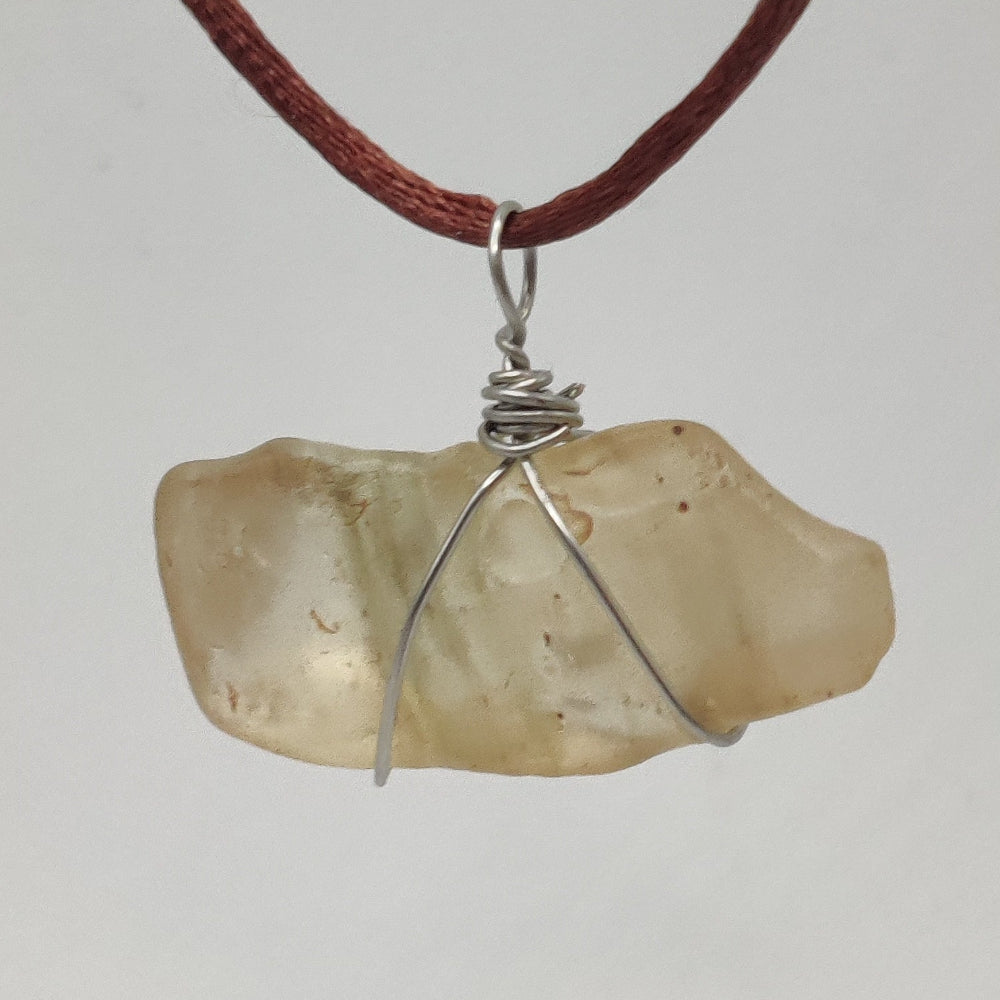 Cristal líbico colgante (Tectita)