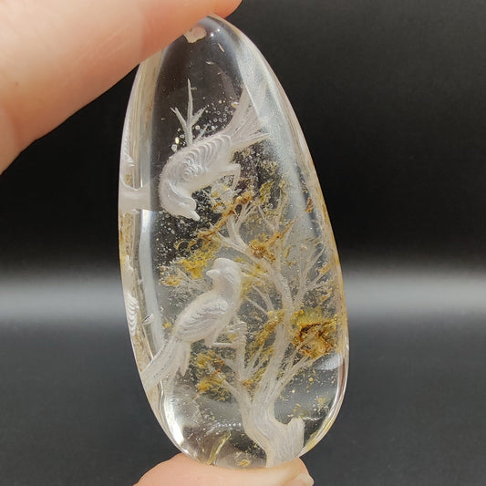 Colgante de cuarzo con talla de aves